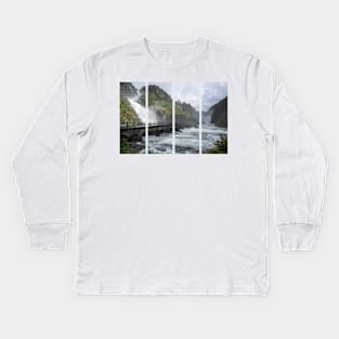 Wonderful landscapes in Norway. Vestland. Beautiful scenery of Latefossen waterfall under the Lotevatnet lake on the Hardanger scenic route. Mountains, trees in background. Cloudy day Kids Long Sleeve T-Shirt